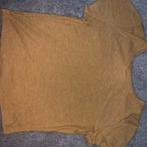 yellow/goldish crop top